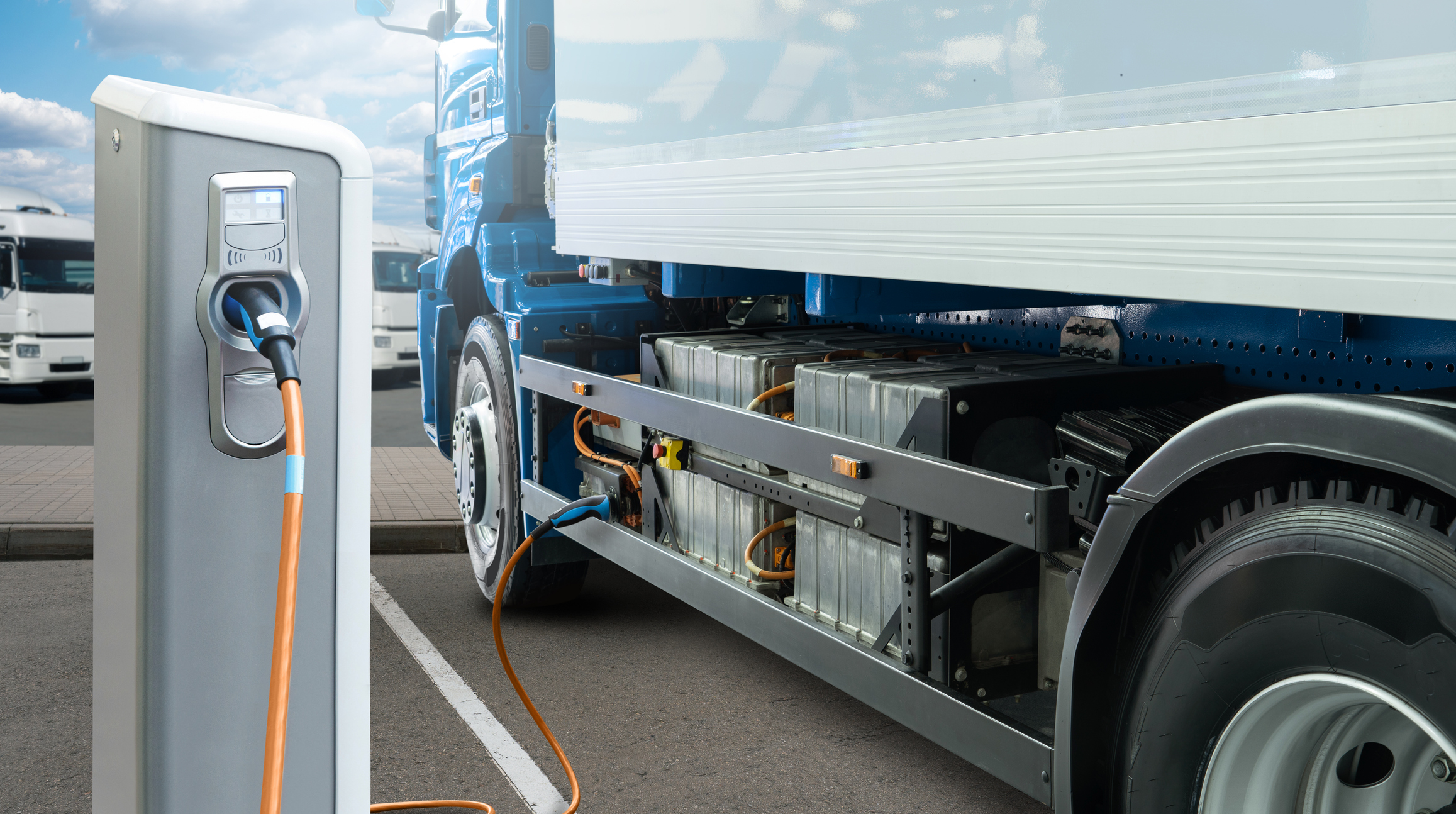 Electric truck with charging station stock photo.jpg