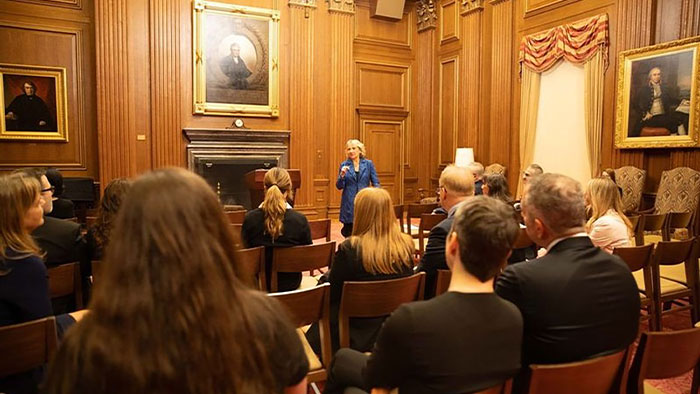 RLC President Deborah White shared SCOTUS fun facts while the group waited