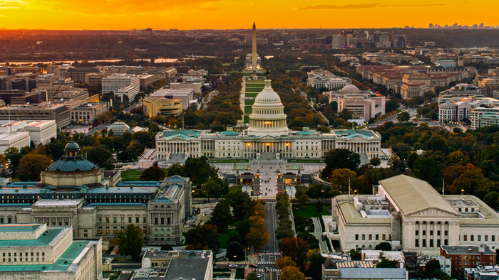Orange Sunset Sky Behind Capitol Complex and Washington Monument.png